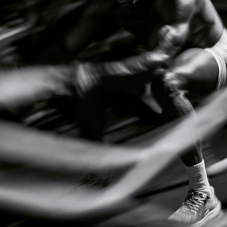 Athlete sprinting in low light